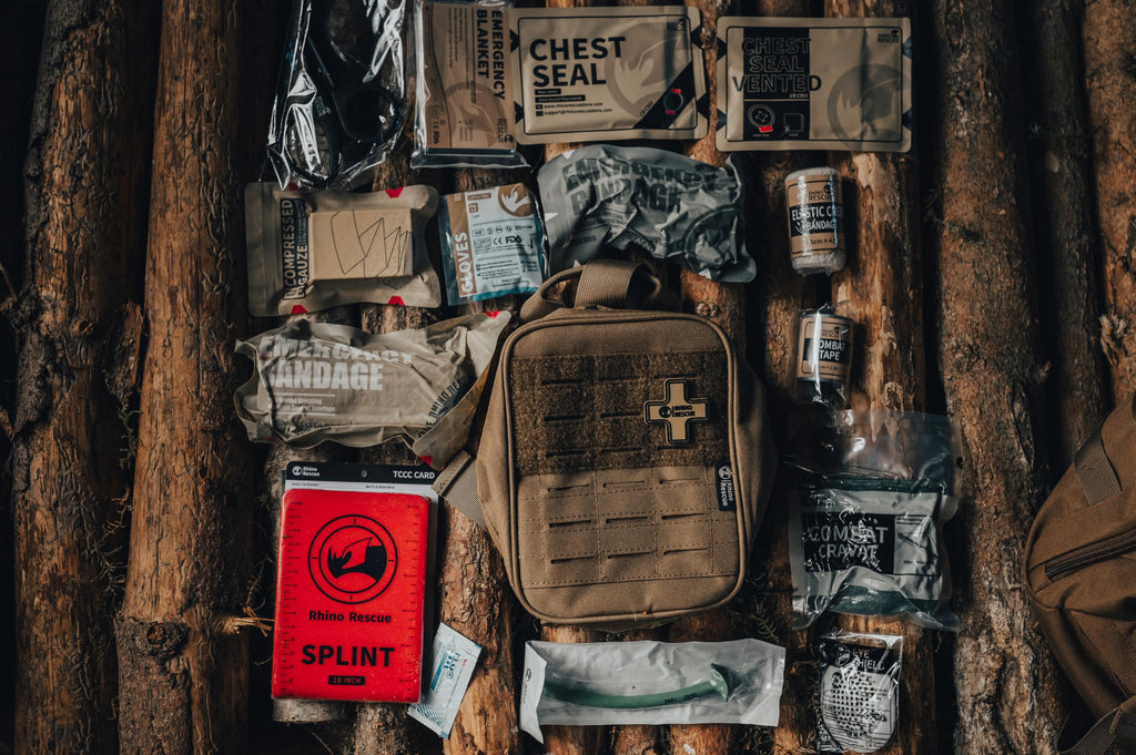 RHINO RESCUE IFAK Trauma Kit with C-A-T Tourniquet, Tactical First Aid Kit Molle Pouch for Military, Combat, Car, Camping, Hiking, Travel (Red)